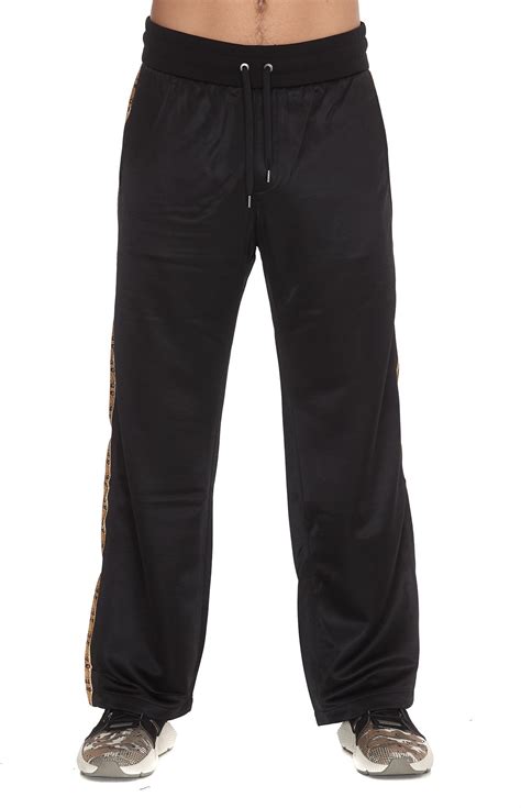 vintage versace black leather pants|Versace track pants.